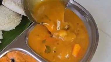 Homemade sambar premix and prepared sambar in a bowl